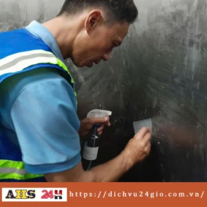 lột decal thang máy