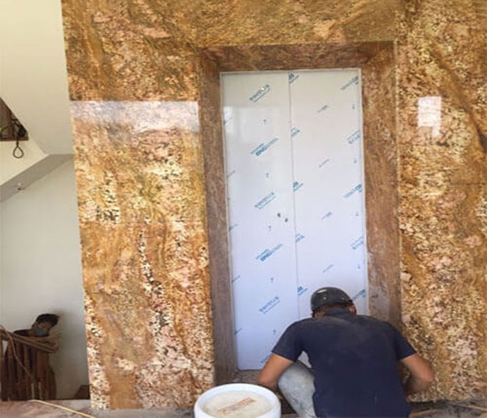 Đánh bóng bức tường đá